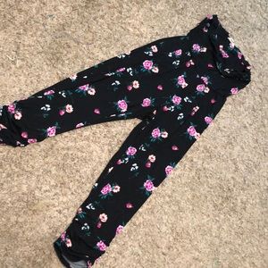 The brand is No Comment. Size is Medium and the color is black with flowers.